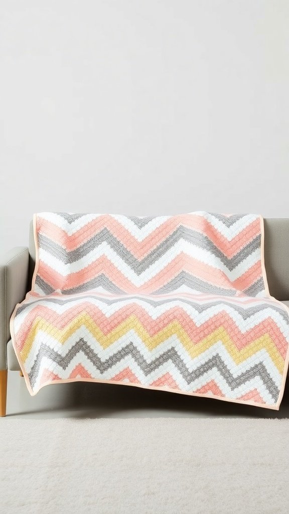 A colorful chevron quilt draped over a couch, featuring pink, gray, and yellow zigzag patterns.