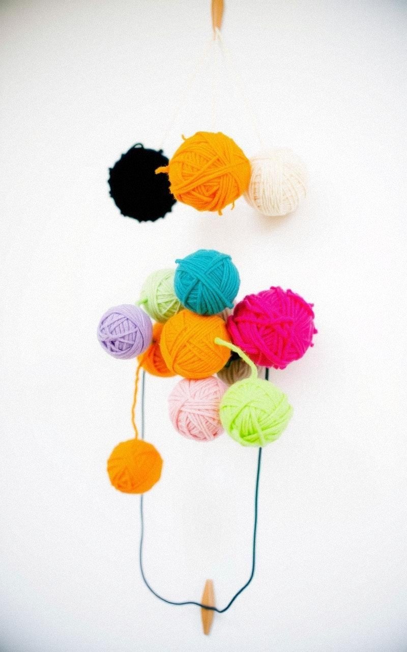 Design a Cheerful Pom Pom Wall Hanging